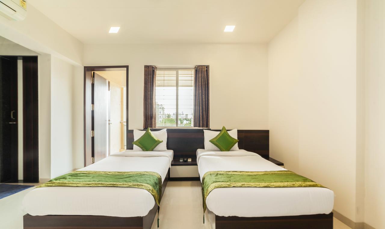 Treebo Trend Abode Hotel Nashik Exterior photo